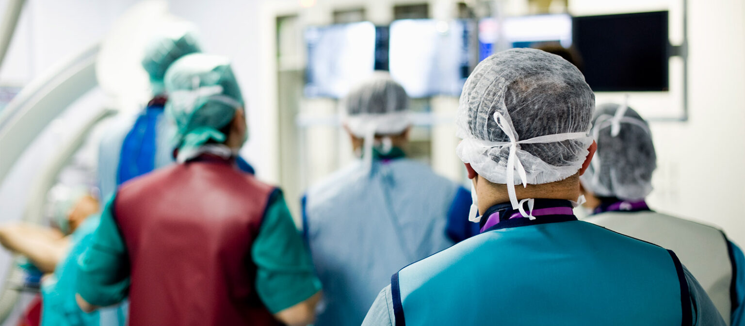 A team of nurses in the CathLab room